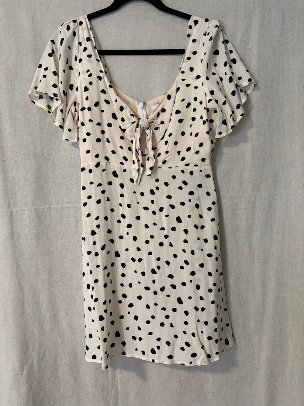 Lush Cream Mini Dress with Black Polka Dots and Tie-Front